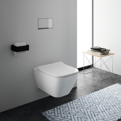 Product Lifestyle Image of Geberit Smyle Square Short Projection Compact Wall Hung Toilet and Seat in white bathroom  - 500.379.01.1
